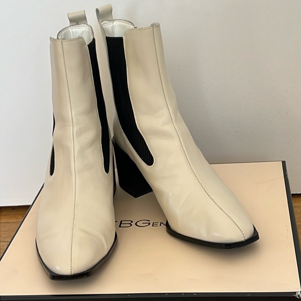 Women’s leather winter white booties with original box.  Size 9.